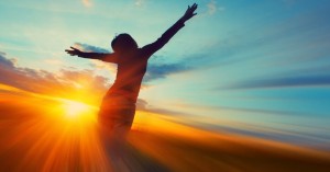 14064-woman-sunset-girl-arms-blue-sky-clouds-silhouette.1200w.tn